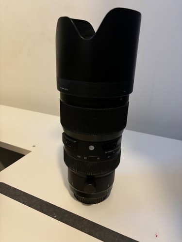 Sigma 100mm 8 dc - sigma, 1.8